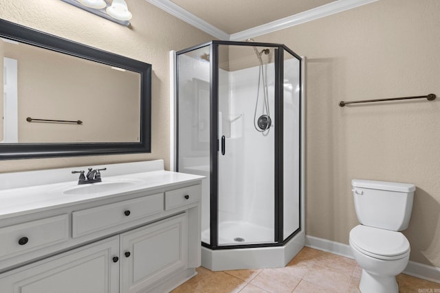 bathroom featuring tile patterned floors, toilet, crown molding, vanity, and a shower with door