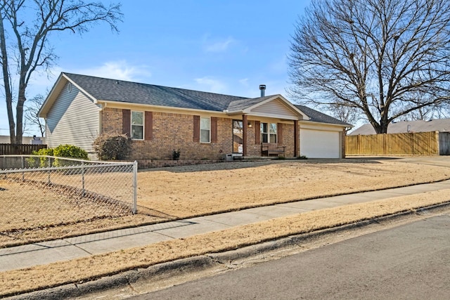 ranch-style house featuring a garage