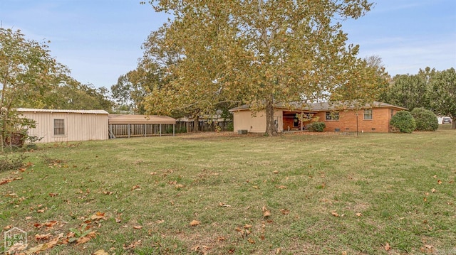 view of yard with a carport