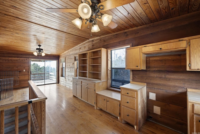 kitchen featuring wood ceiling, ceiling fan, lofted ceiling, and light wood-type flooring