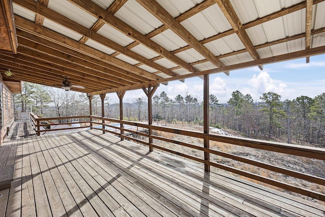 wooden terrace featuring ceiling fan