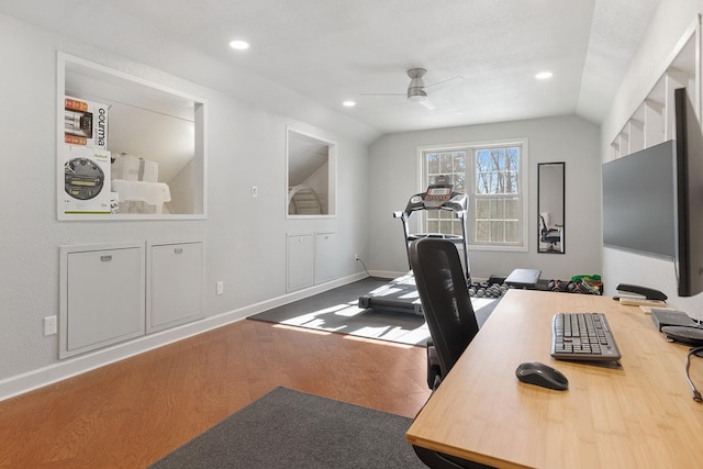 office featuring hardwood / wood-style flooring, vaulted ceiling, and ceiling fan