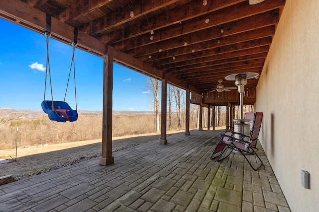 view of patio with ceiling fan