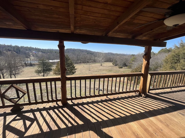 wooden terrace with ceiling fan and a rural view