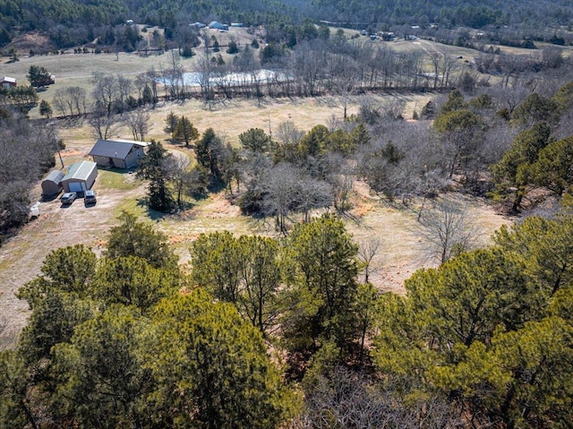 birds eye view of property featuring a rural view