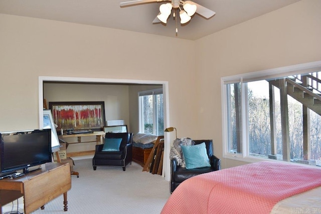 carpeted bedroom featuring a ceiling fan