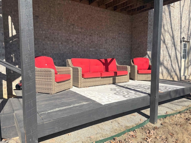 view of patio / terrace featuring an outdoor living space and a deck