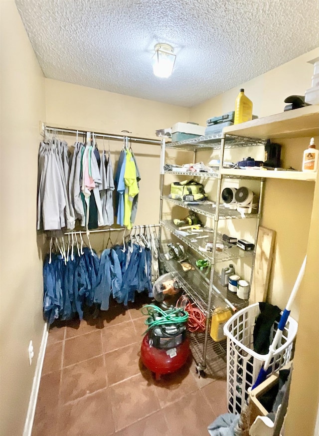 spacious closet with tile patterned flooring