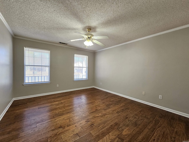 spare room with ornamental molding, dark hardwood / wood-style flooring, a textured ceiling, and ceiling fan