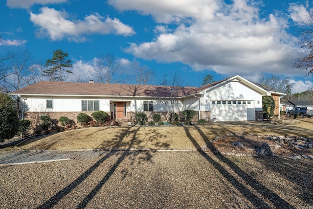 single story home featuring a garage