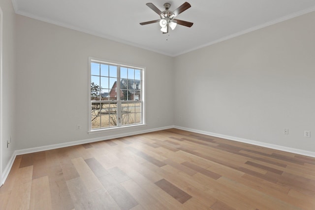 empty room featuring crown molding, ceiling fan, and light hardwood / wood-style floors