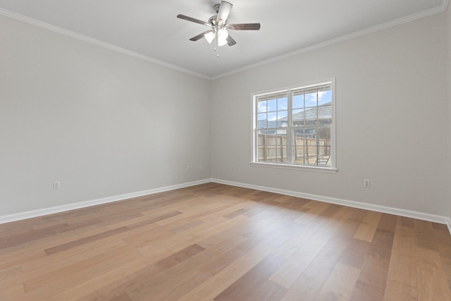 empty room with crown molding, light hardwood / wood-style flooring, and ceiling fan