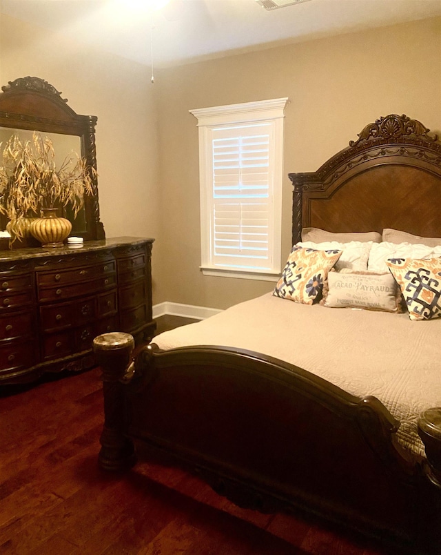 bedroom featuring hardwood / wood-style flooring