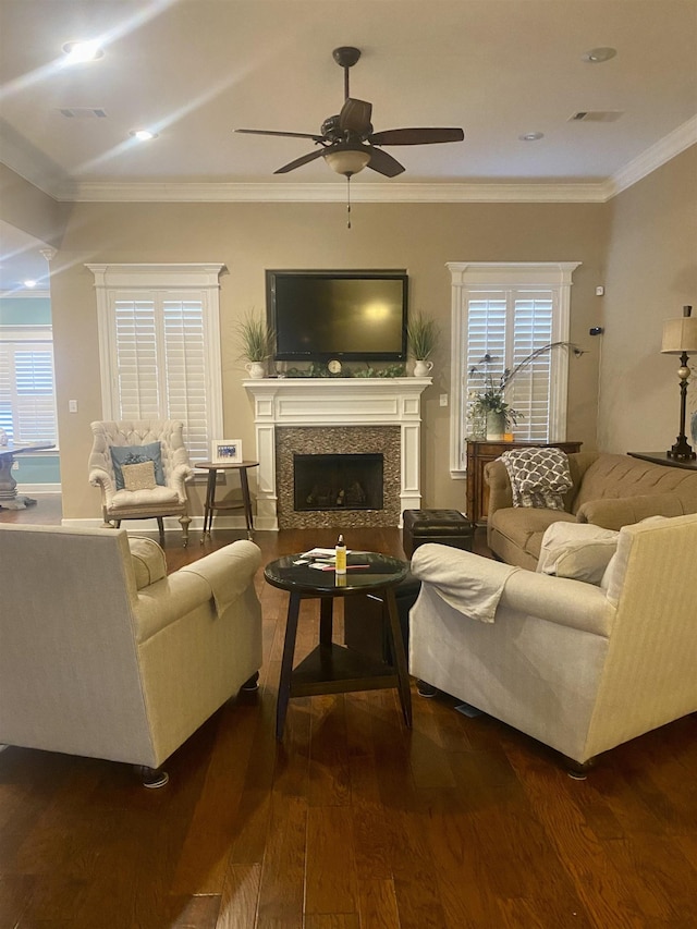 living room featuring crown molding, ceiling fan, and dark hardwood / wood-style flooring