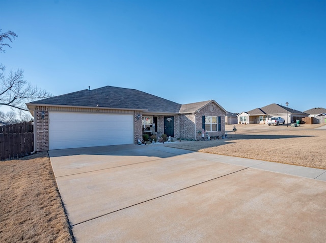 ranch-style home with a garage