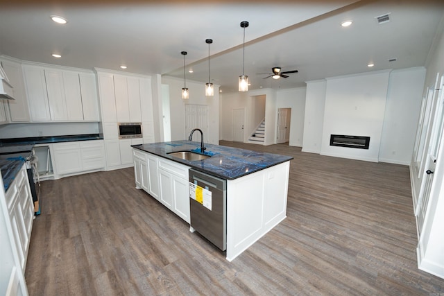 kitchen featuring white cabinetry, appliances with stainless steel finishes, and sink