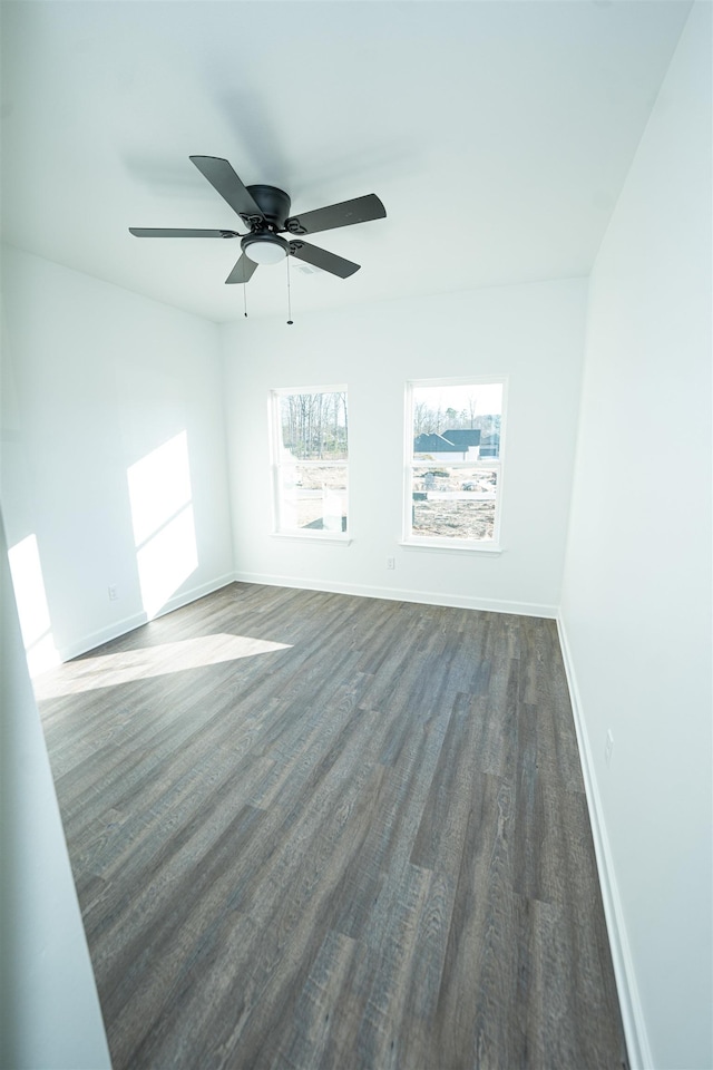 unfurnished room featuring dark hardwood / wood-style floors