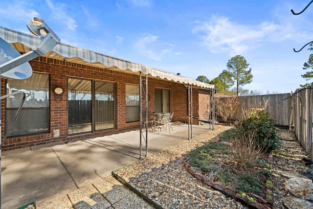 back of house featuring a patio area