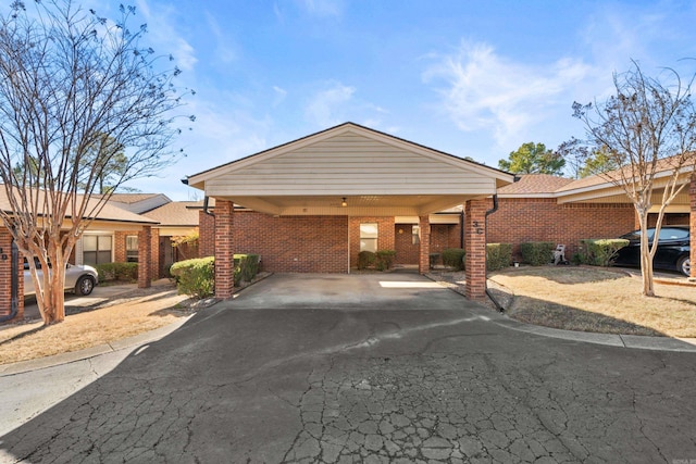 view of front of home with a carport