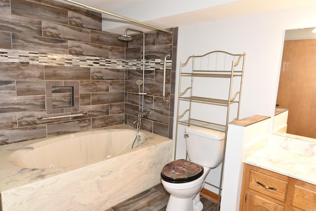 full bathroom with vanity, toilet, and tiled shower / bath combo