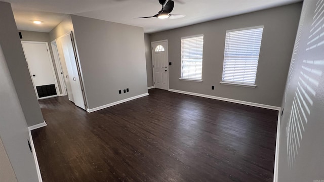 entrance foyer with dark hardwood / wood-style floors and ceiling fan