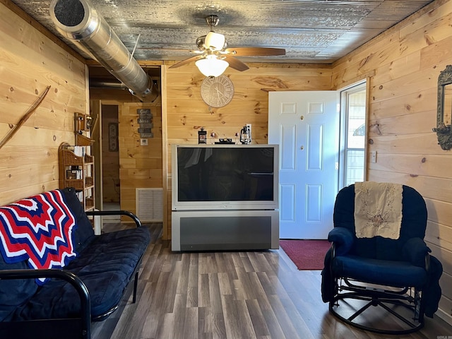 living room with wooden walls