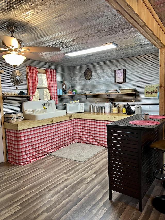 kitchen featuring hardwood / wood-style floors and wood ceiling