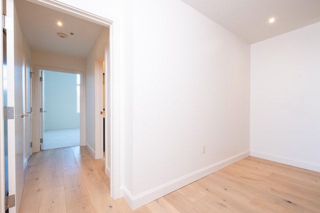 hall featuring light hardwood / wood-style floors