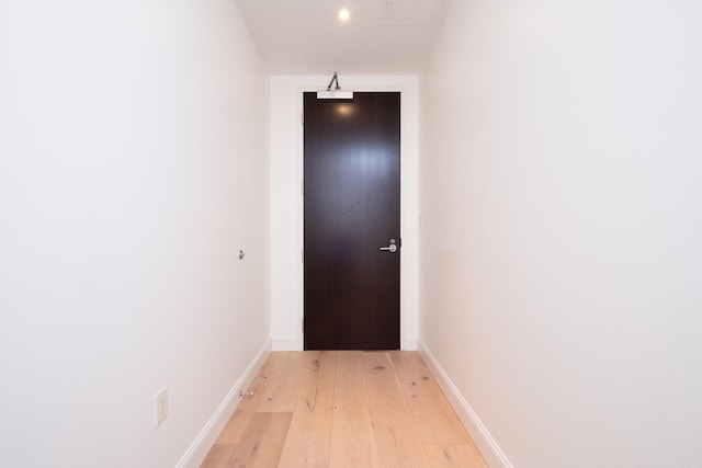 doorway to outside featuring light wood-type flooring