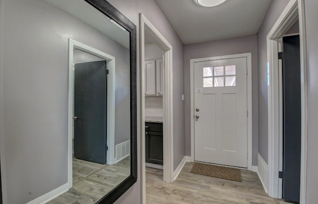 foyer entrance featuring light hardwood / wood-style floors