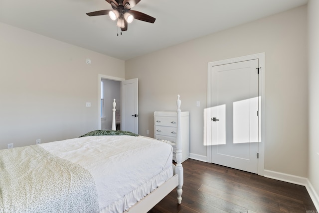 bedroom featuring ceiling fan and dark hardwood / wood-style floors