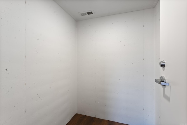 spare room featuring dark wood-type flooring