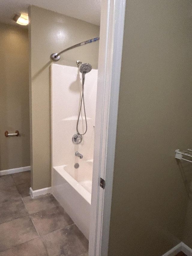 bathroom with  shower combination and tile patterned flooring