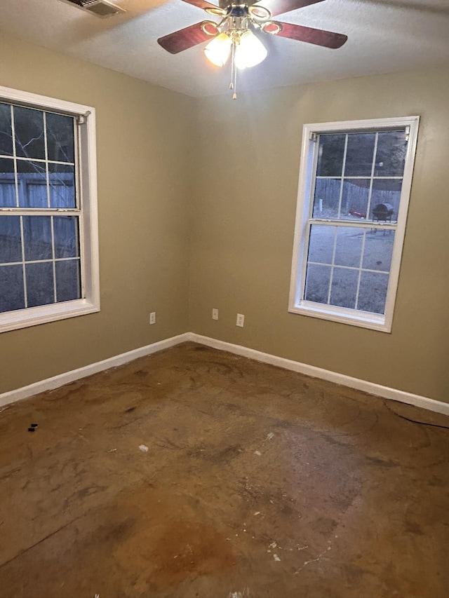 unfurnished room featuring ceiling fan