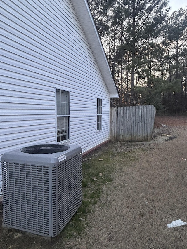 view of yard with central air condition unit