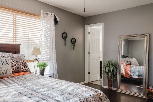 bedroom featuring dark hardwood / wood-style floors