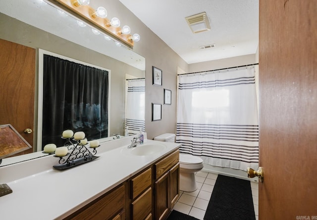 full bathroom featuring vanity, tile patterned floors, shower / bath combination with curtain, and toilet