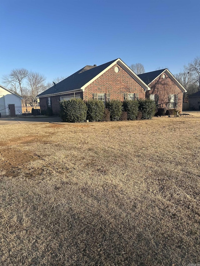 view of home's exterior featuring a lawn