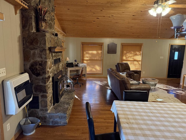 living room featuring heating unit, wood ceiling, dark wood-type flooring, and vaulted ceiling