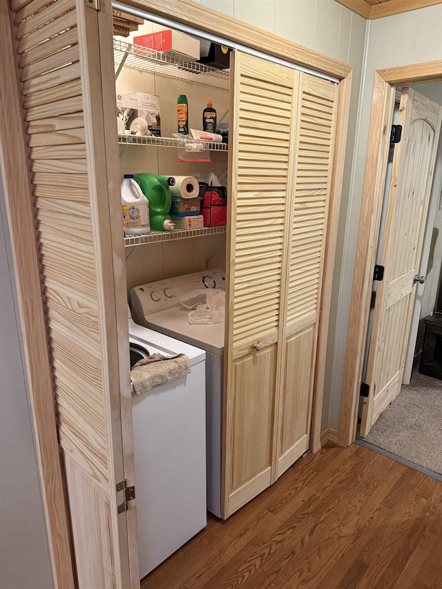 washroom featuring washer and clothes dryer and hardwood / wood-style floors