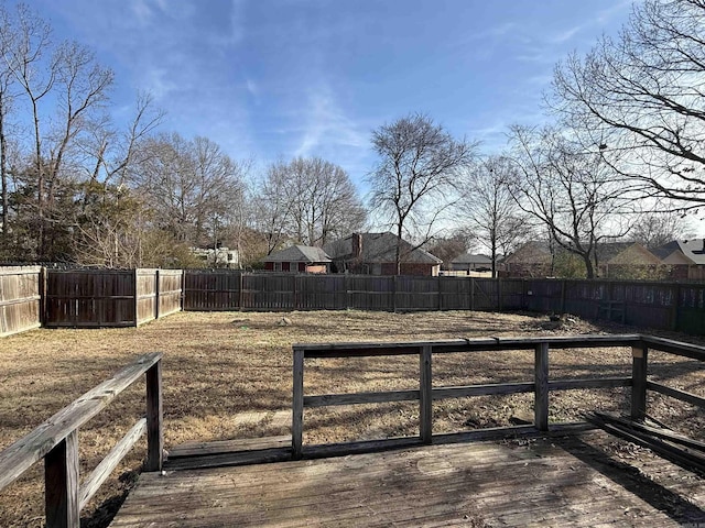 view of yard with a wooden deck