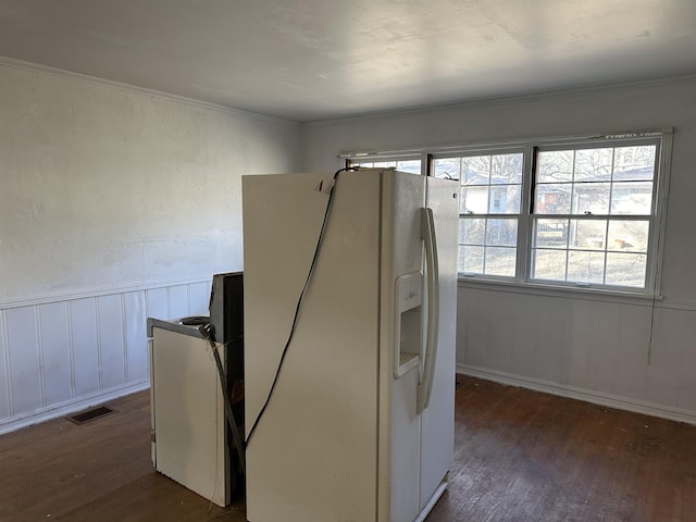 kitchen with white refrigerator with ice dispenser and dark hardwood / wood-style floors