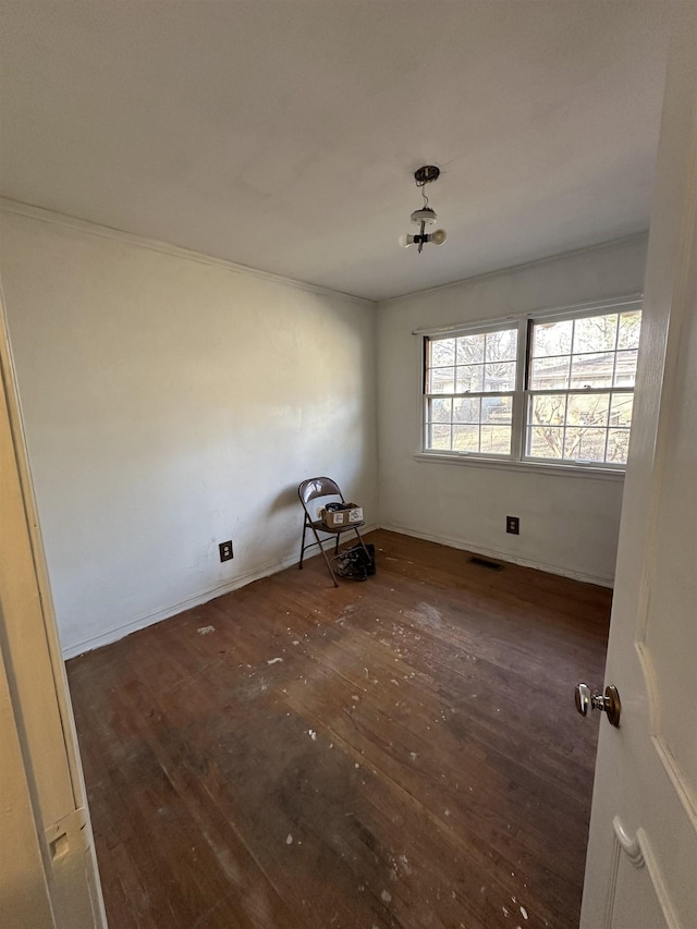 unfurnished room with dark hardwood / wood-style floors