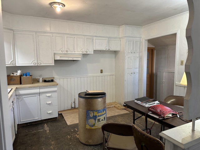 kitchen with crown molding and white cabinets