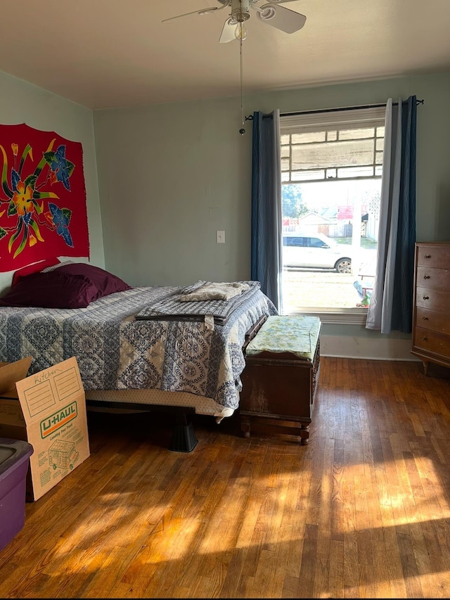 bedroom featuring ceiling fan and hardwood / wood-style floors