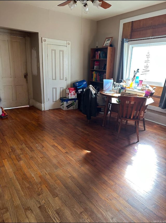 dining area featuring dark hardwood / wood-style floors and ceiling fan