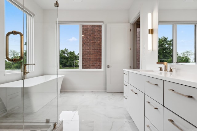 bathroom featuring vanity and a bathtub