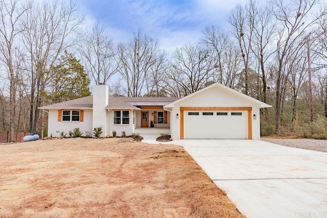 ranch-style house featuring a garage