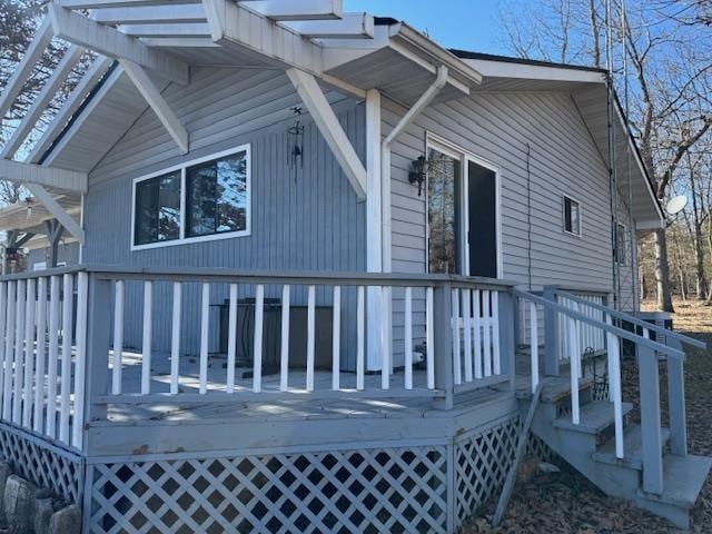 exterior space featuring a wooden deck