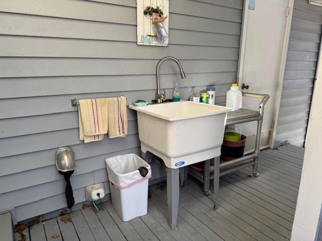 wooden terrace featuring sink